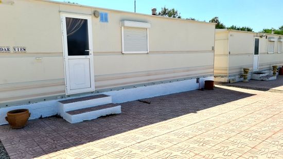Outside of the holiday home : 1 bed, 1 bath mobile home for sale in Calle Mayor