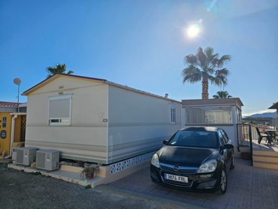 Outside of the mobile home : 1 bed, 1 bath mobile home for sale in Las Bouganvillas